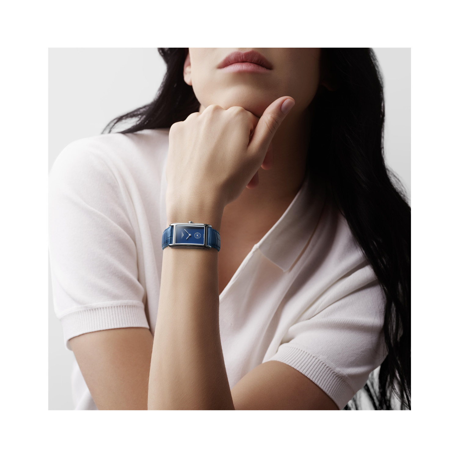 Longines, DolceVita Monochrome with a 23.3 x 37mm stainless steel case and blue leather strap featuring a small seconds hand and a blue dial.