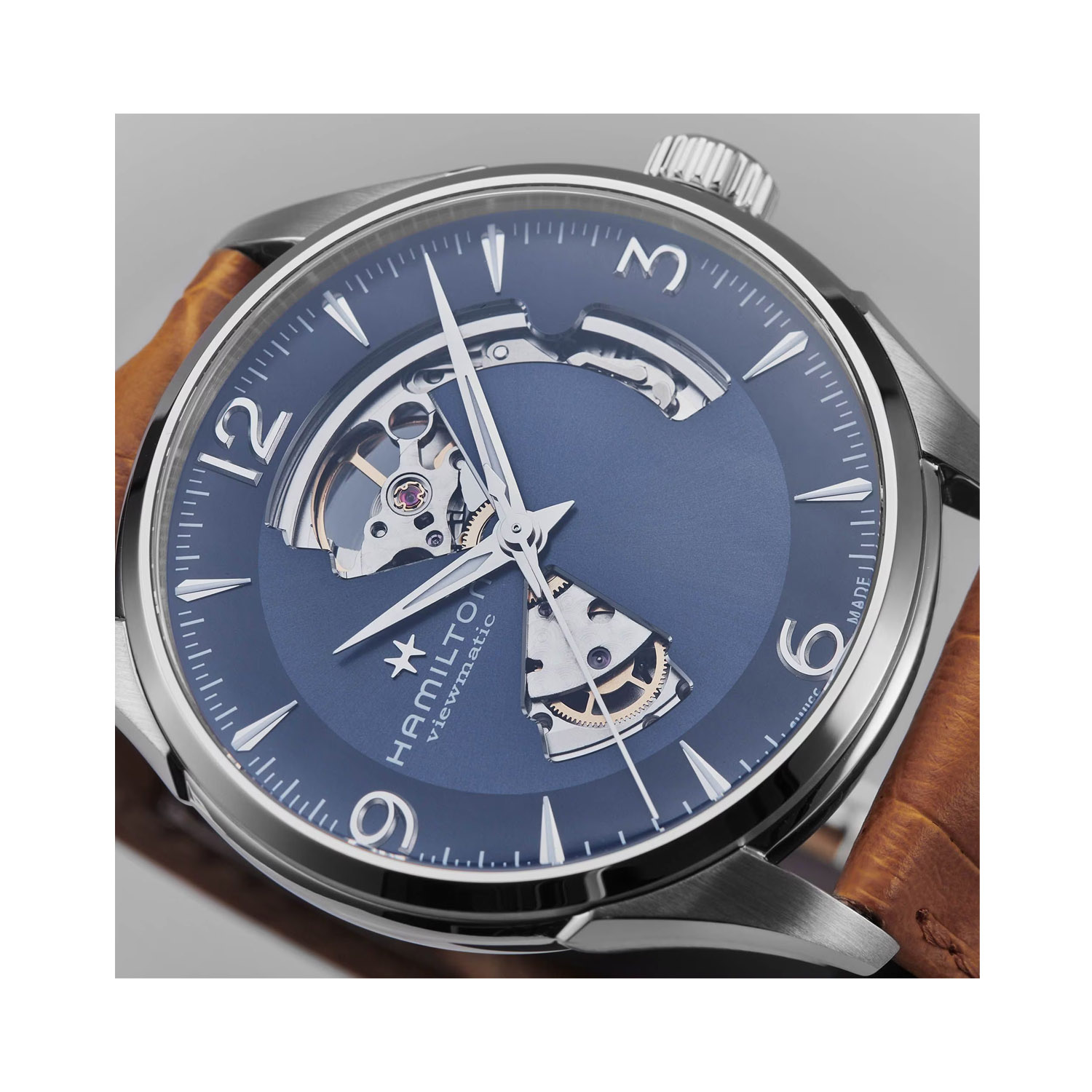 Hamilton, Jazzmaster Open Heart Brown Strap, Automatic Men's Watch Hamilton, Jazzmaster Open Heart with a 42mm stainless steel case and a brown leather strap featuring a blue open heart dial.