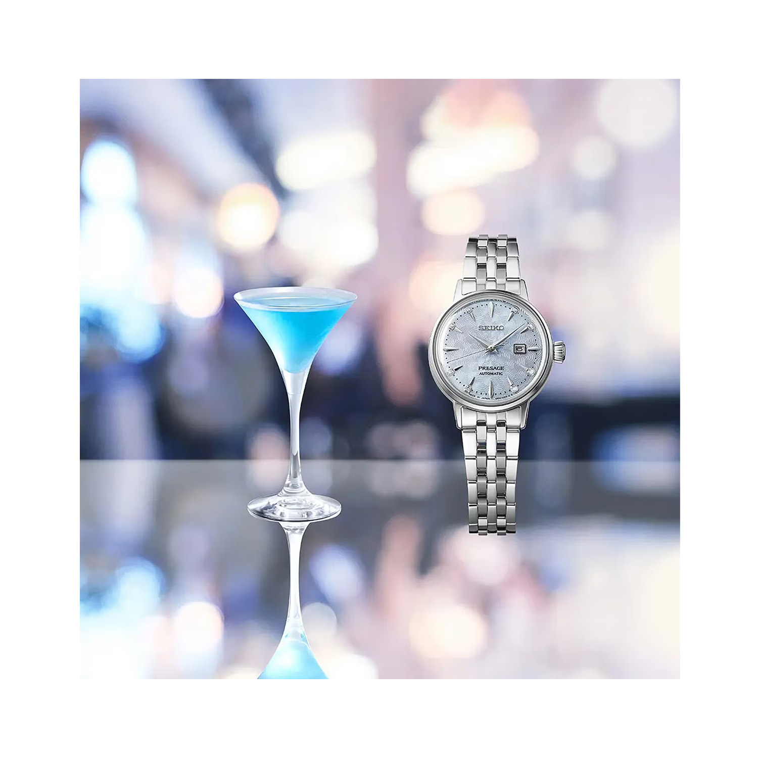Seiko, Presage Cocktail Time 'Skydiving' Diamond Twist with a 30.3mm stainless steel case and bracelet strap featuring a date function and a diamond set blue patterned dial.