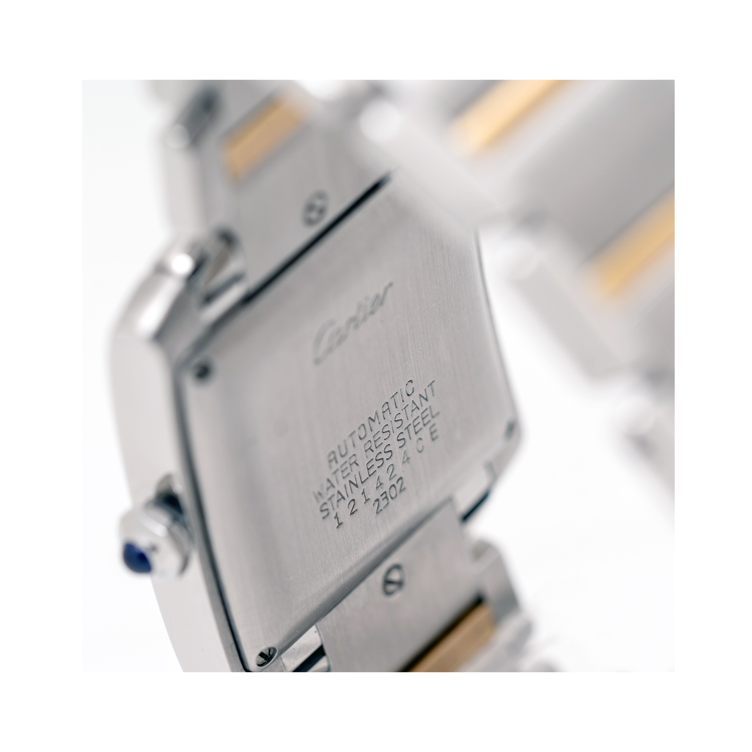 Cartier, Tank Francaise with a 28 x 30mm stainless steel and 18ct yellow gold case and bracelet strap featuring a date function and a white dial.