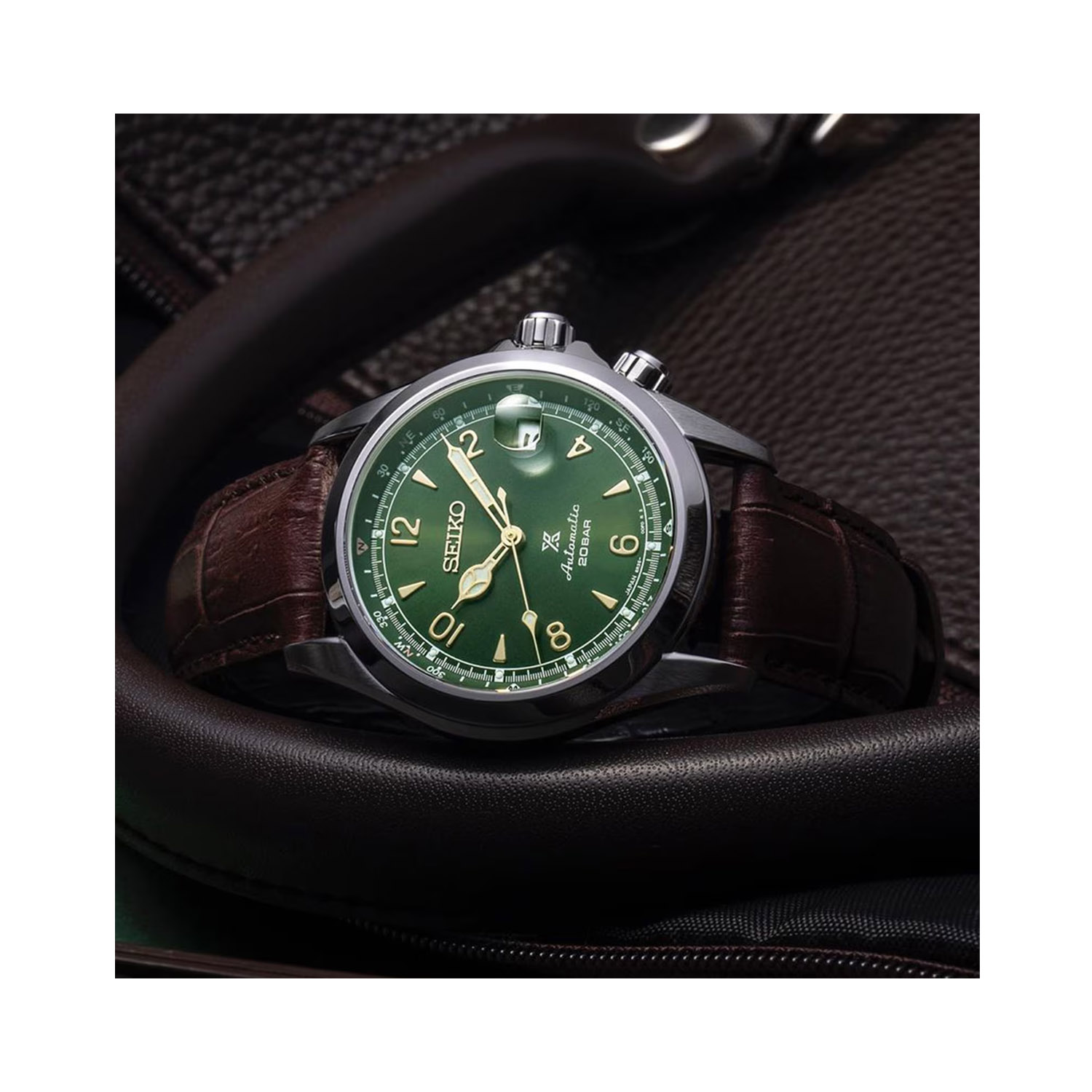 Seiko, Prospex 'Alpinist' Green with a 39.5mm stainless steel case and a brown leather strap featuring a date function and a green dial.