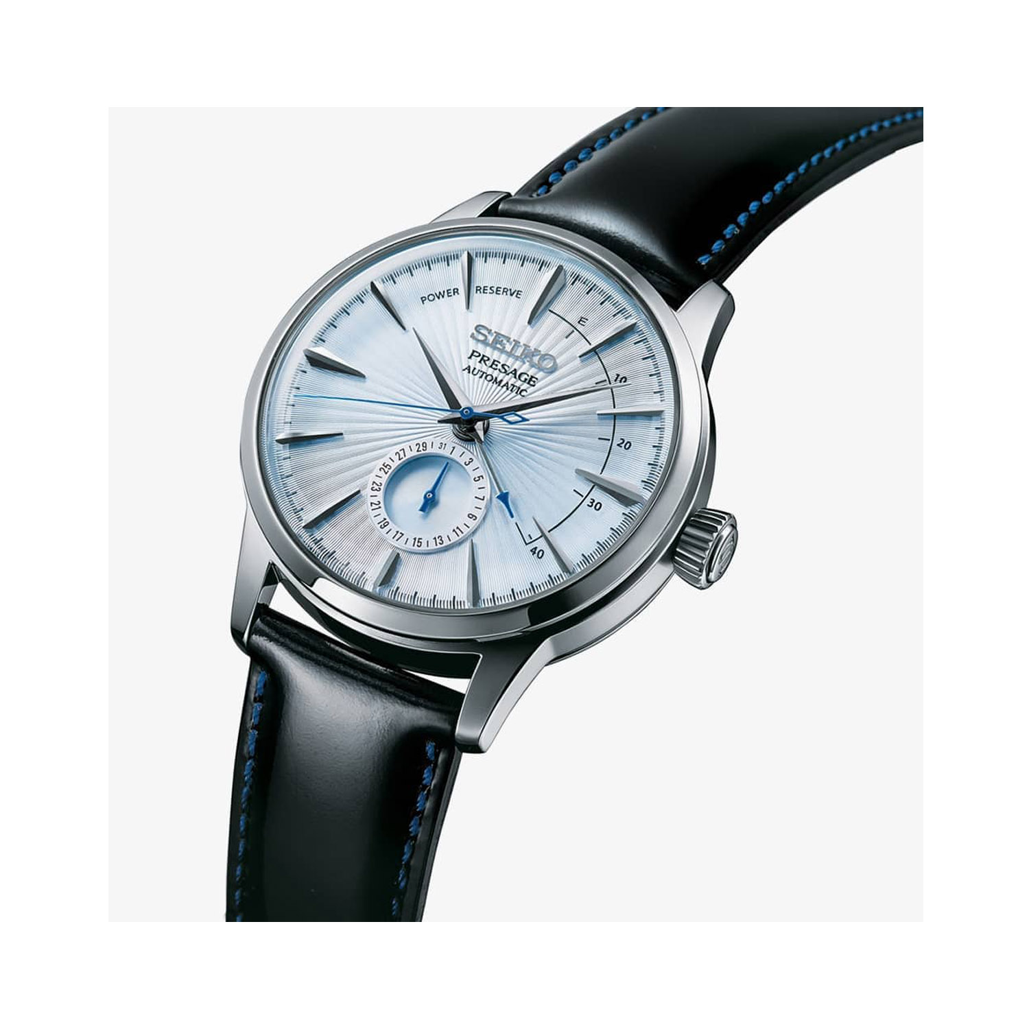 Seiko, Presage Cocktail Time 'Skydiving' with a 40.5mm stainless steel case and a black leather strap featuring a light blue patterned dial.