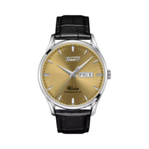 Tissot, Heritage Visodate Powermatic 80 with a 42mm stainless steel case and a black leather strap featuring a day date function and a champagne coloured dial.