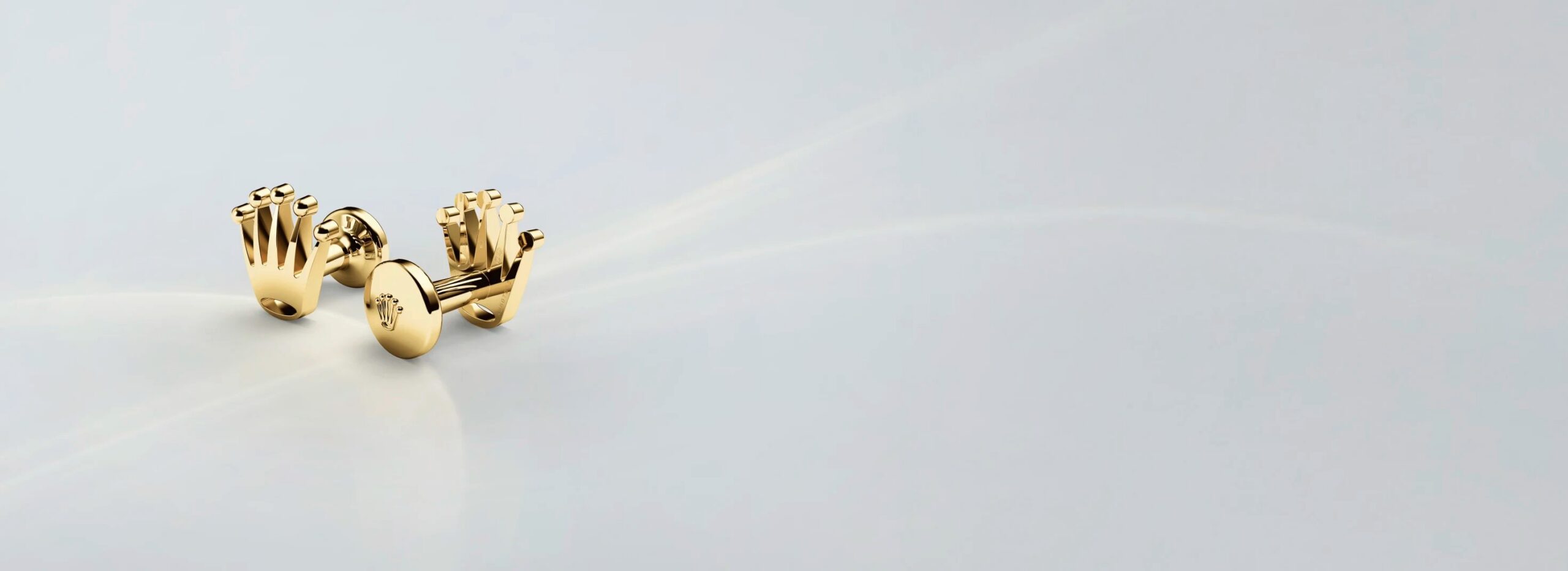 Rolex crown cufflinks in yellow gold