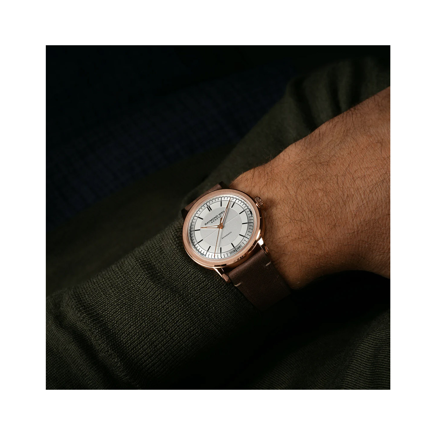 Raymond Weil, Millesime with a 39.5mm stainless steel case and a brown leather strap featuring a silver dial.