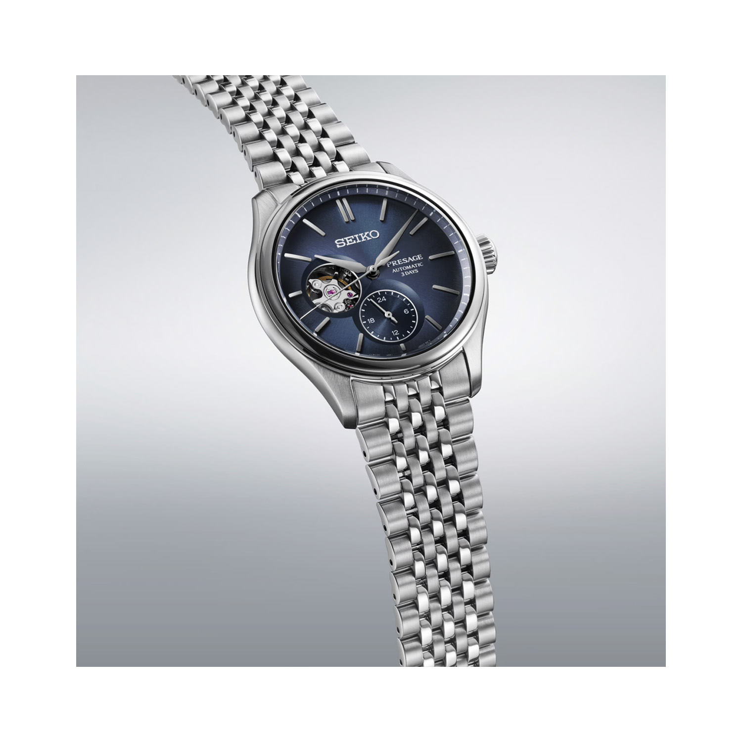 Seiko, Presage Classic Open Heart 'Ai-iro' Japan Blue with a 40.2mm stainless steel case and bracelet strap featuring a blue open heart dial.