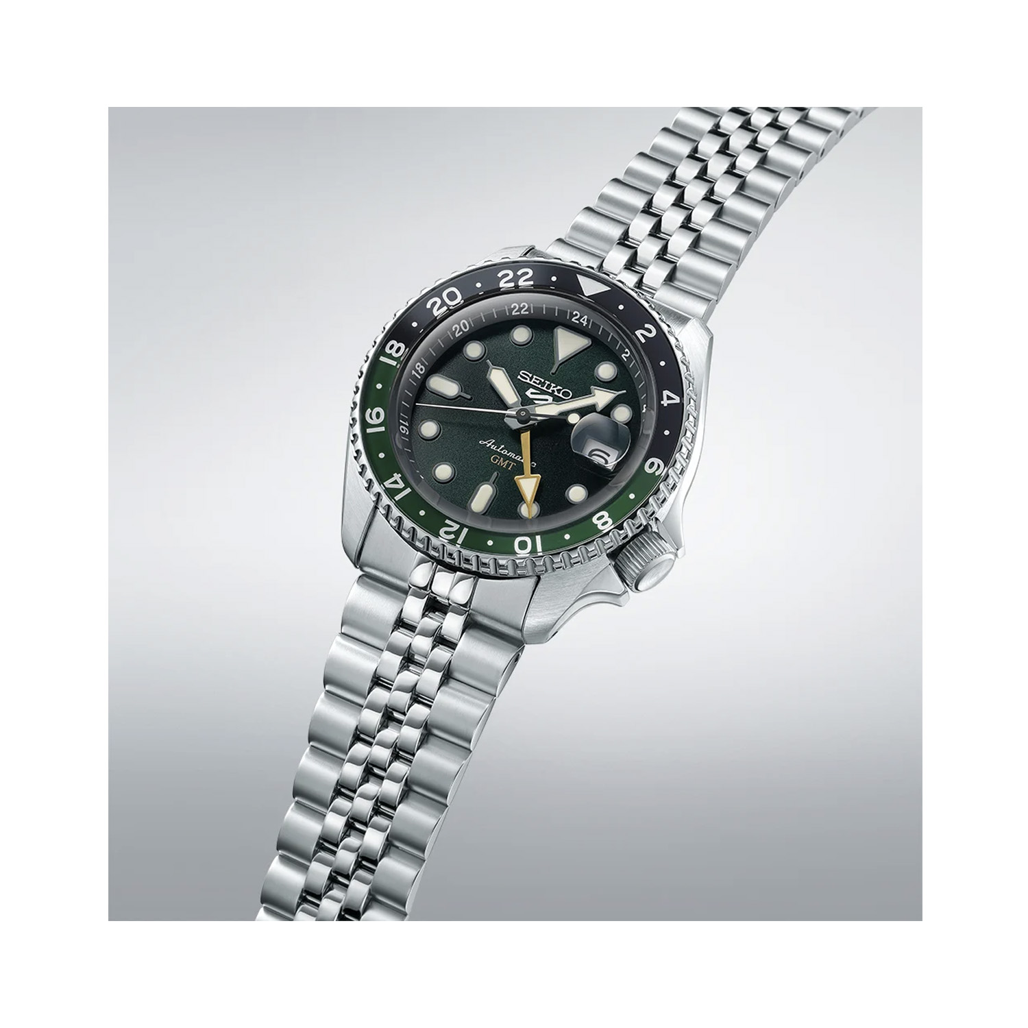Seiko, 5 Sports SKX GMT with a 42.5mm stainless steel case and bracelet strap featuring a date function and a green dial with a black and green bezel.