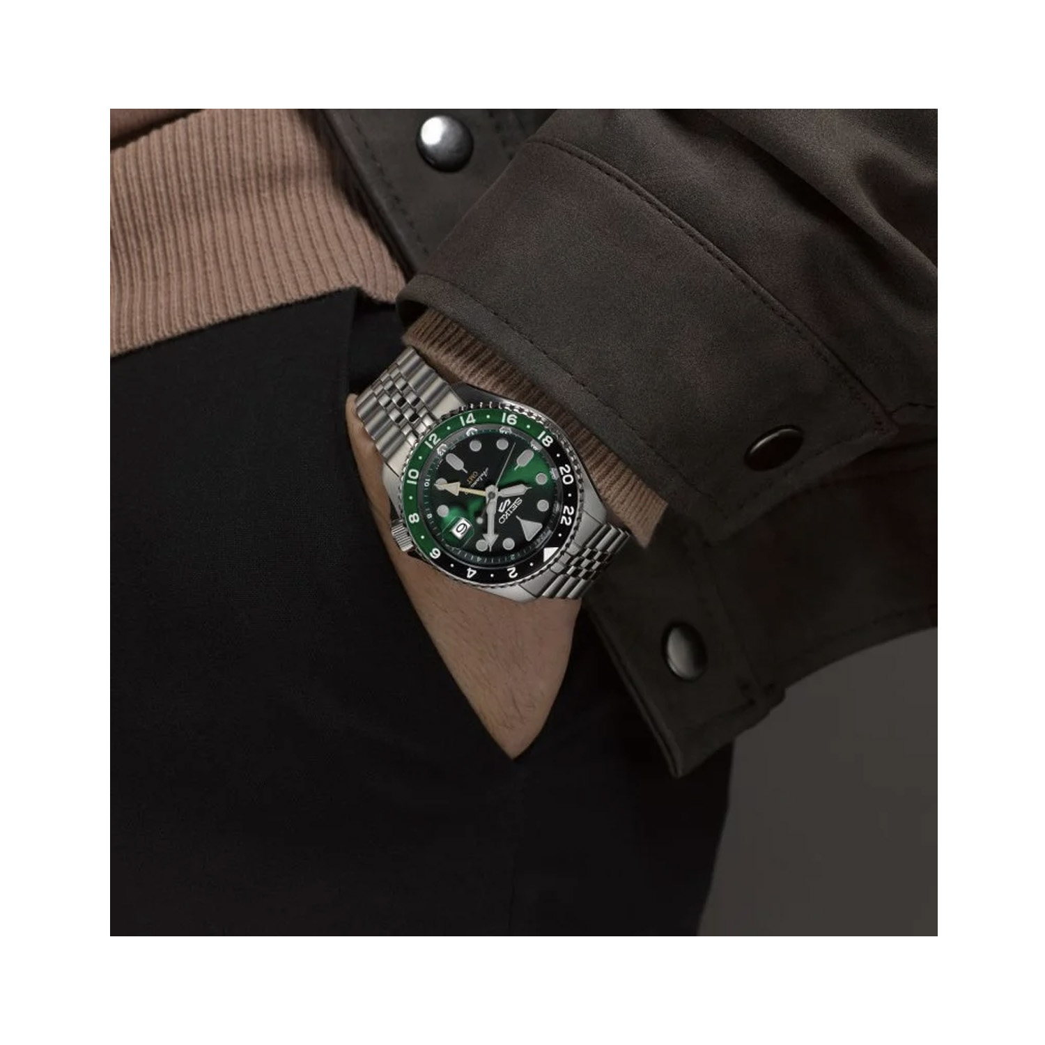 Seiko, 5 Sports SKX GMT with a 42.5mm stainless steel case and bracelet strap featuring a date function and a green dial with a black and green bezel.