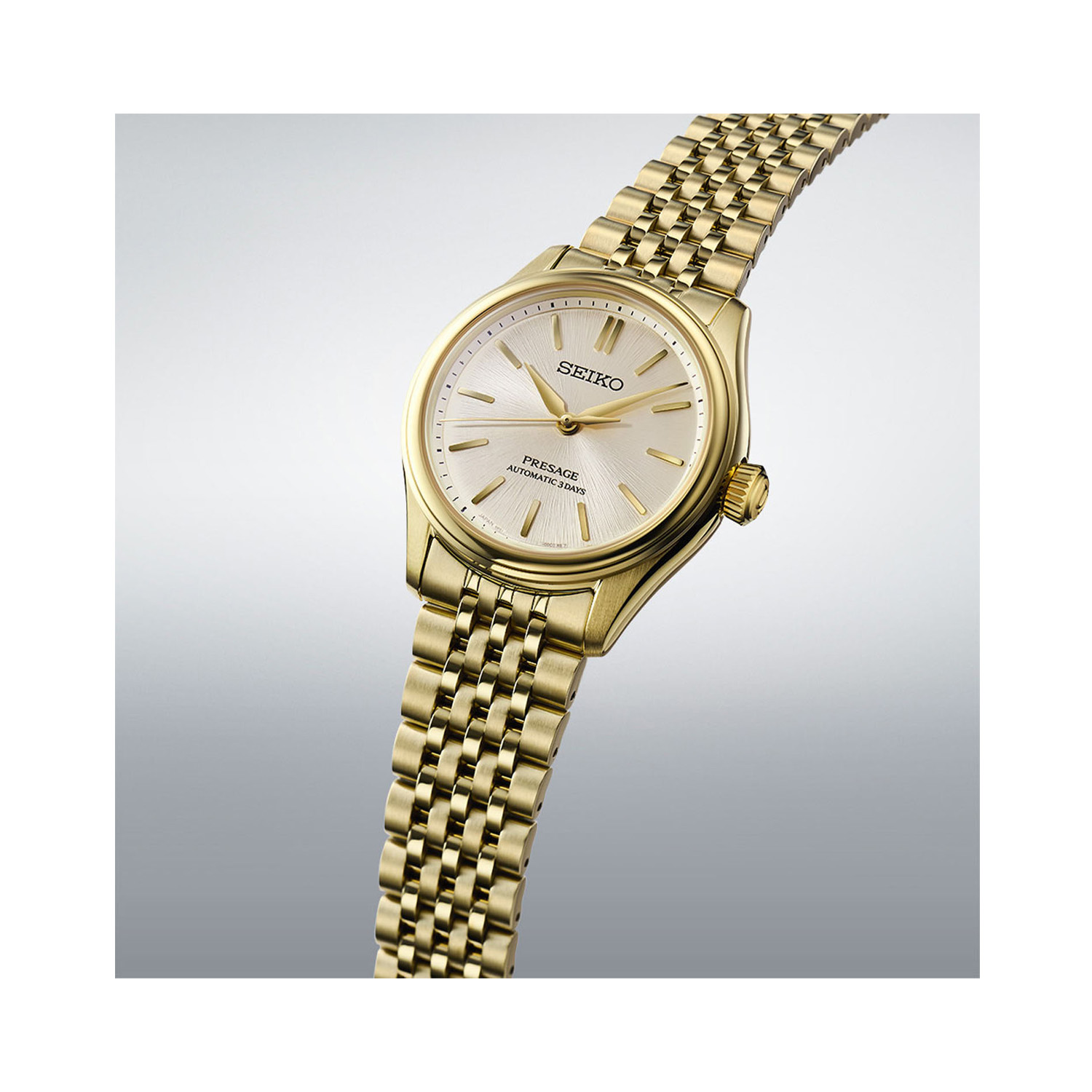 Seiko, Presage Classic Series ‘Shiro-iro’ with a 36mm stainless steel yellow gold PVD coated case and bracelet strap featuring a white dial.