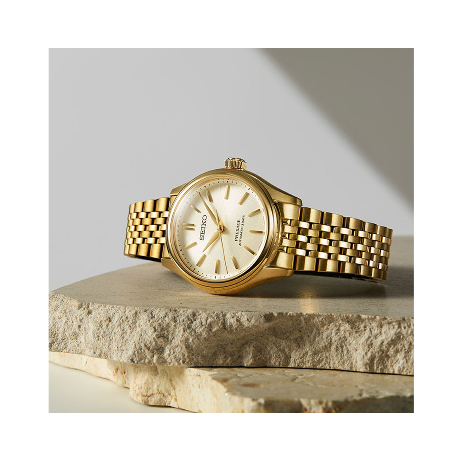 Seiko, Presage Classic Series ‘Shiro-iro’ with a 36mm stainless steel yellow gold PVD coated case and bracelet strap featuring a white dial.