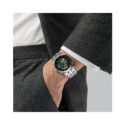 Hamilton, Jazzmaster Open Heart with a 42mm stainless steel case and bracelet strap featuring a green open heart dial.