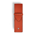 A Montblanc, Envelope pen pouch crafted in vibrant tangerine Saffiano-printed leather with space for two writing instruments and finished with the Montblanc emblem.