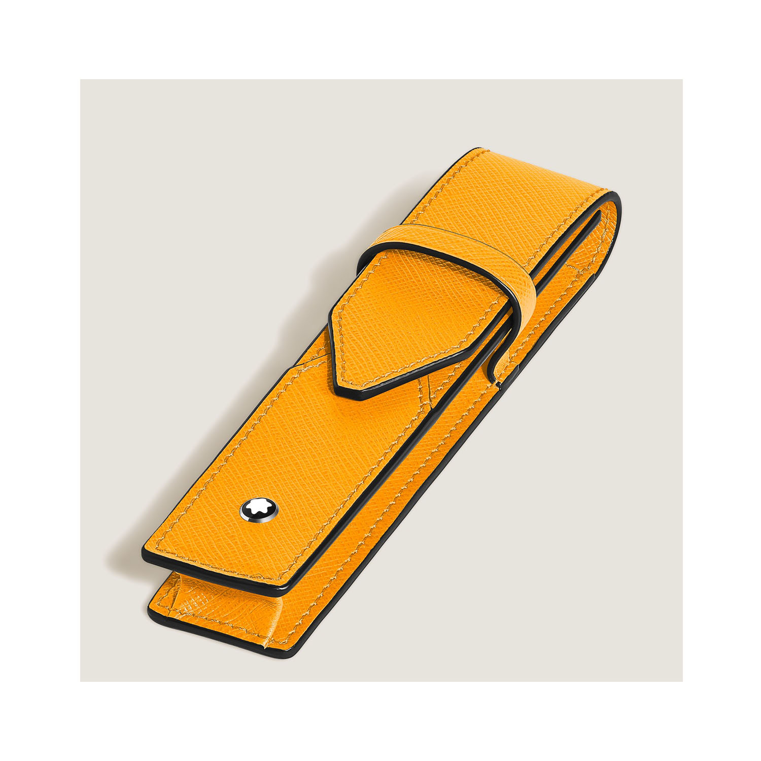 A Montblanc, Envelope pen pouch crafted in embossed Sartorial leather with space for one writing instrument and finished with the Montblanc emblem.