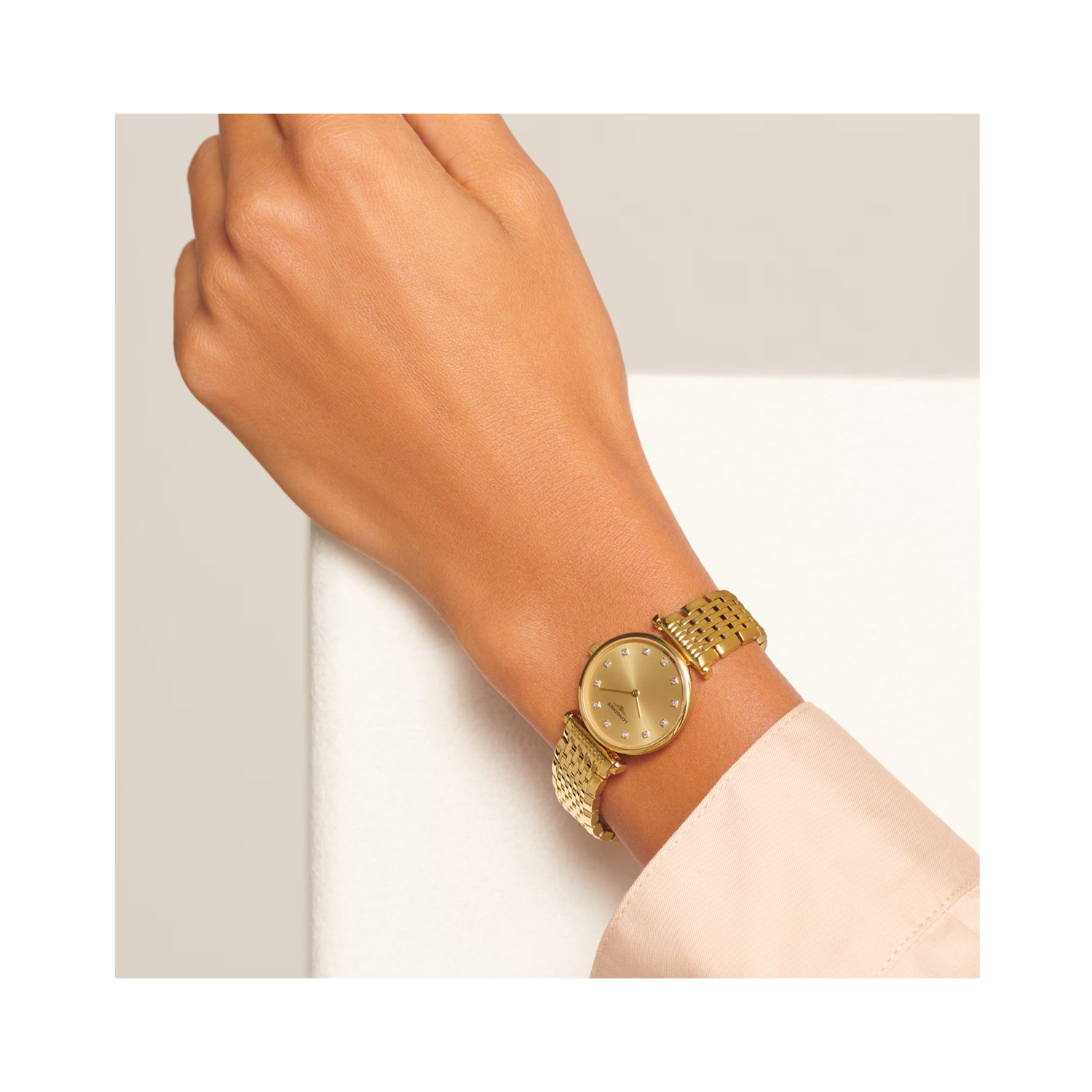 Longines, La Grande Classique with a 24mm yellow gold PVD coated stainless steel case and bracelet strap featuring a champagne coloured diamond set dial.