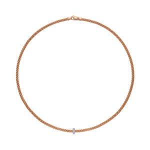An 18ct rose gold Flex'It necklace with a single white gold diamond set rondel, belonging to the FOPE Prima collection.