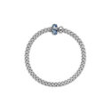 An 18ct white gold Flex’It bracelet with a sapphire and diamond set rondel and a polished white gold rondel, belonging to the FOPE Solo collection.