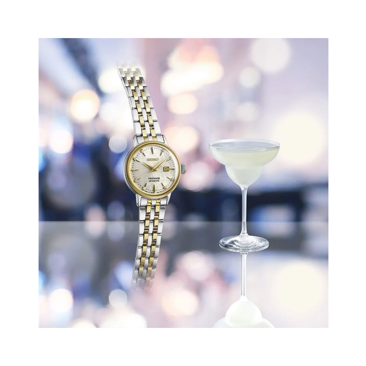 Seiko, Presage Cocktail Time 'White Lady' Diamond Twist with a 30.3mm stainless steel two tone case and bracelet strap featuring a date function and a diamond set white dial.