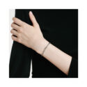 FOPE, EKA Collection, 18ct White Gold Diamond Flex'It Bracelet: 0.01 carats An 18ct white gold Flex'It bracelet with a single diamond set rondel belonging to the FOPE EKA collection.