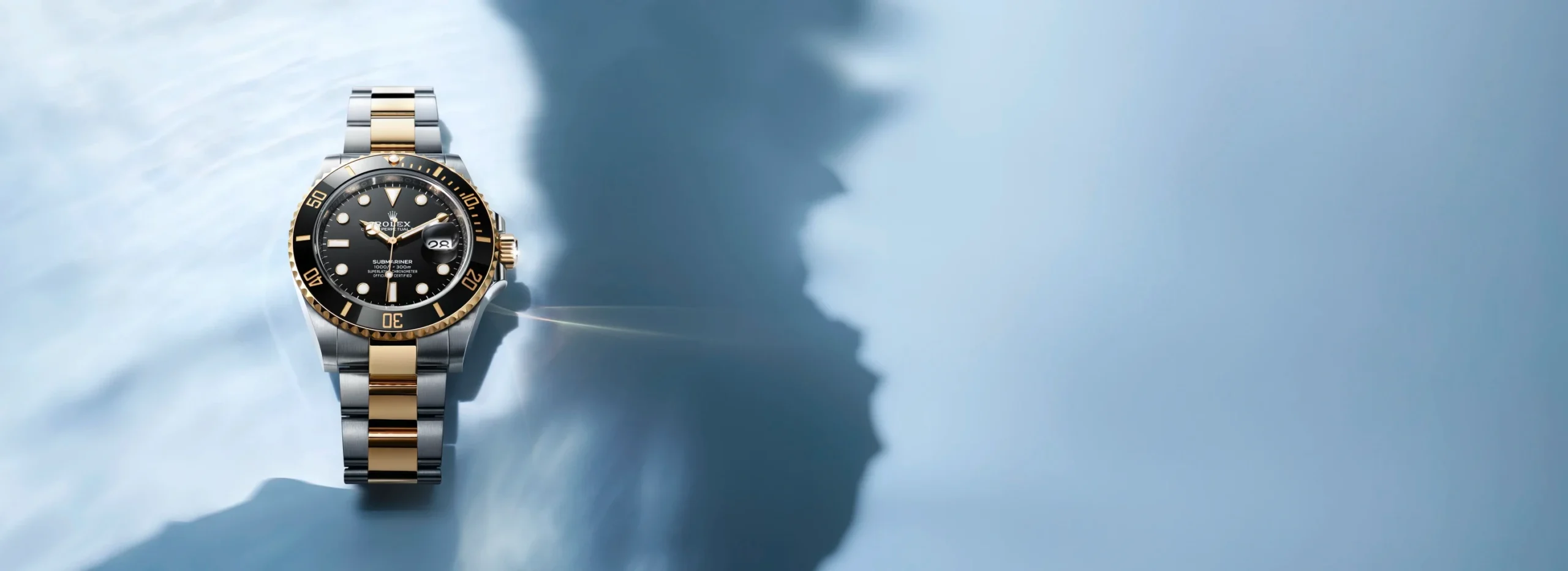 Rolex Submariner M126613LN-0002 on blue background