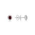A pair of 18ct white gold oval shaped ruby and round brilliant cut diamond set cluster stud earrings, with a post and butterfly fastening for pierced ears.