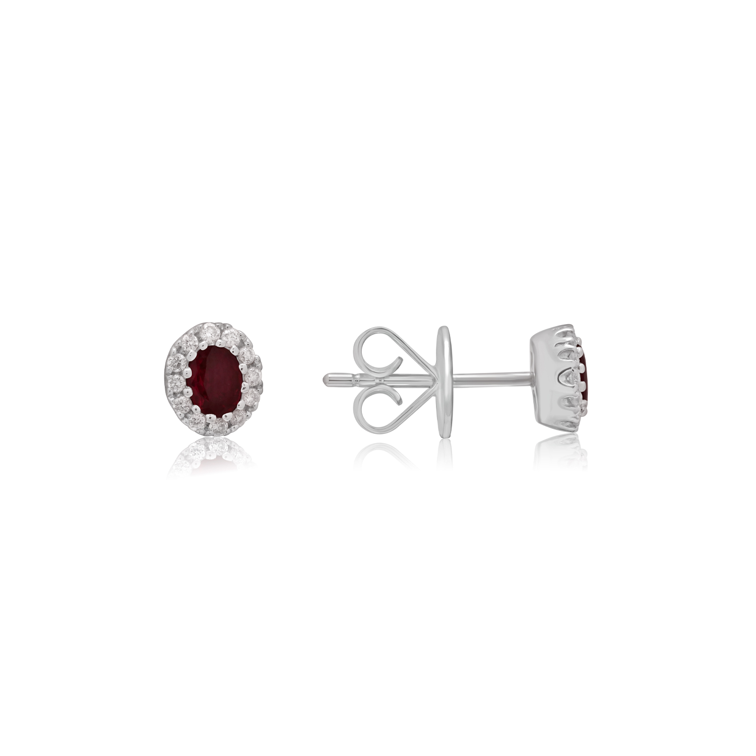 A pair of 18ct white gold oval shaped ruby and round brilliant cut diamond set cluster stud earrings, with a post and butterfly fastening for pierced ears.