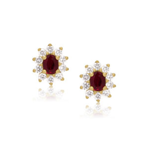 A pair of 18ct yellow gold oval shaped ruby and round brilliant cut diamond cluster stud earrings, with a post and butterfly clip fastening for pierced ears.