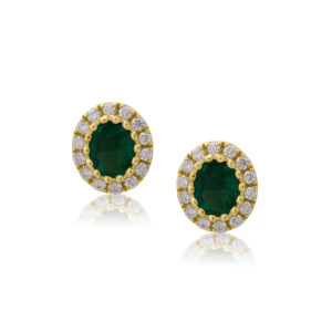 A pair of 18ct yellow gold oval shaped emerald and round brilliant cut diamond set cluster stud earrings, with a post and butterfly fastening for pierced ears.