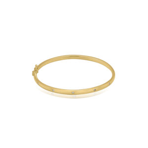 A 9ct yellow gold round brilliant cut diamond set hinged bangle with a polished finish.