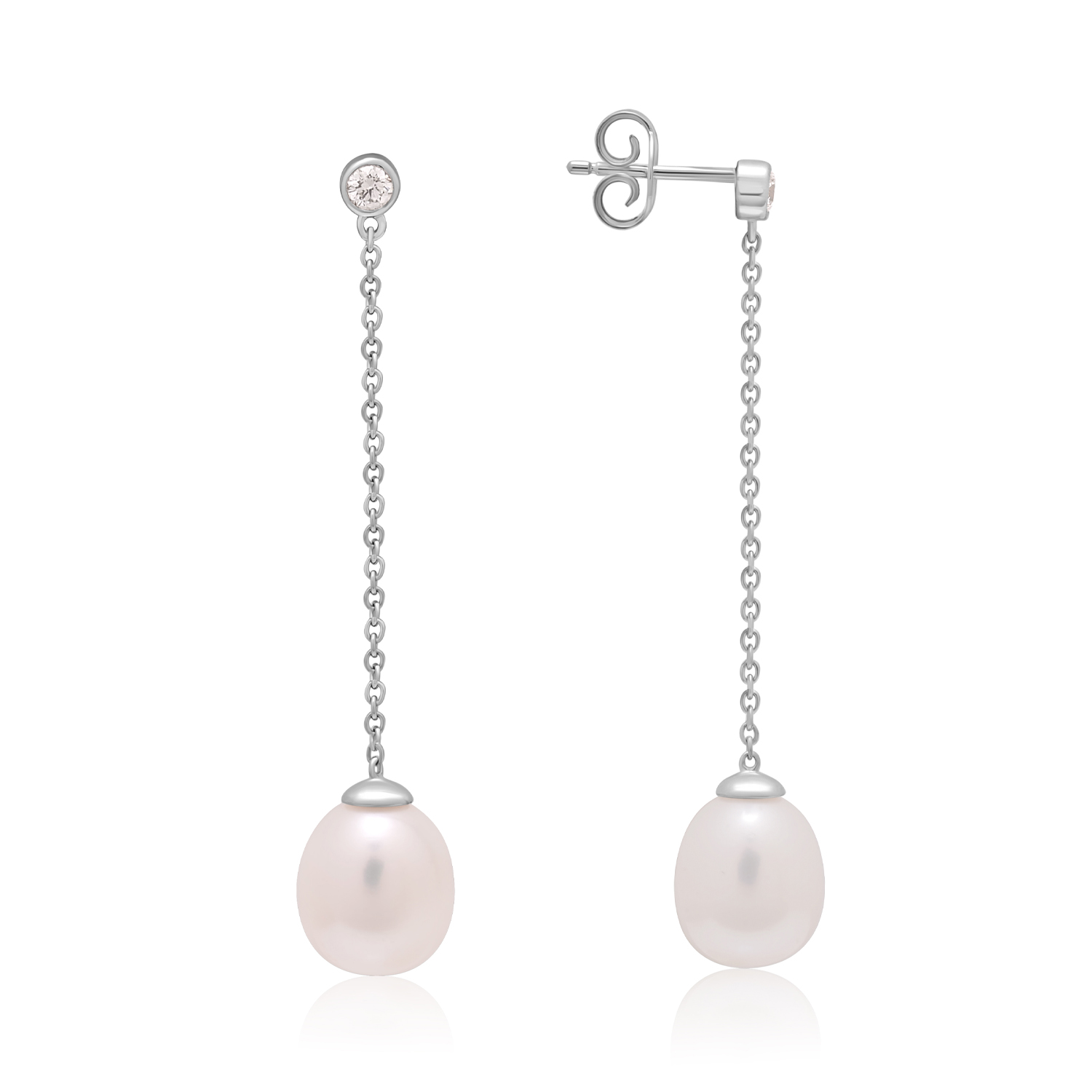 A pair of 9ct white gold freshwater pearl earrings with a single rubover set diamond, with a post and butterfly fastening for pierced ears.