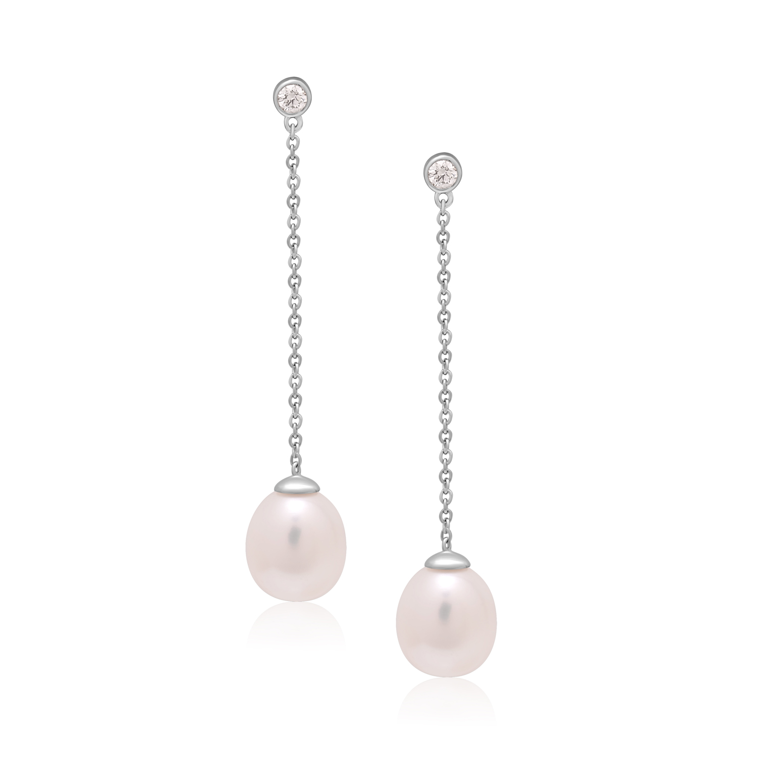 A pair of 9ct white gold freshwater pearl earrings with a single rubover set diamond, with a post and butterfly fastening for pierced ears.