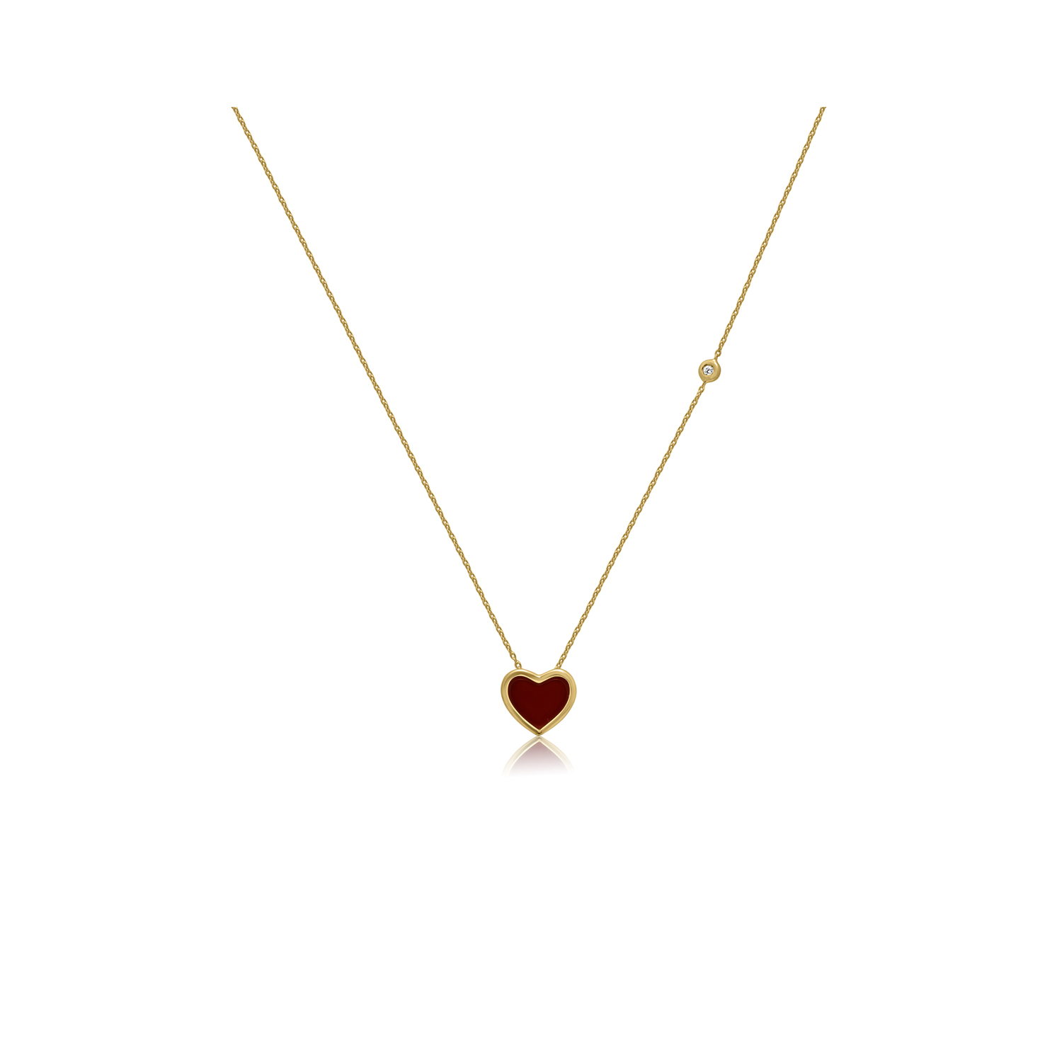 A 9ct yellow gold red, heart shaped cornelian pendant with a small single diamond on a chain.