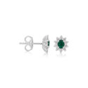 A pair of 18ct white gold oval shaped emerald and round brilliant cut diamond stud earrings, with a post and butterfly clip fastening for pierced ears.