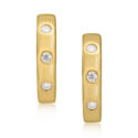 A pair of 18ct yellow gold diamond set hoop style earrings featuring three round brilliant cut diamonds in each earring, for pierced ears.