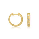 A pair of 18ct yellow gold diamond set hoop style earrings featuring three round brilliant cut diamonds in each earring, for pierced ears.