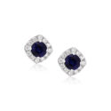 A pair of 18ct white gold round sapphire and brilliant cut diamond cluster stud earrings, with a post and butterfly fastening for pierced ears.