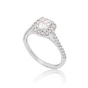 Platinum Asscher Cut Diamond Cluster Ring with Diamond Shoulders A platinum Asscher cut diamond cluster ring with diamond set shoulders.