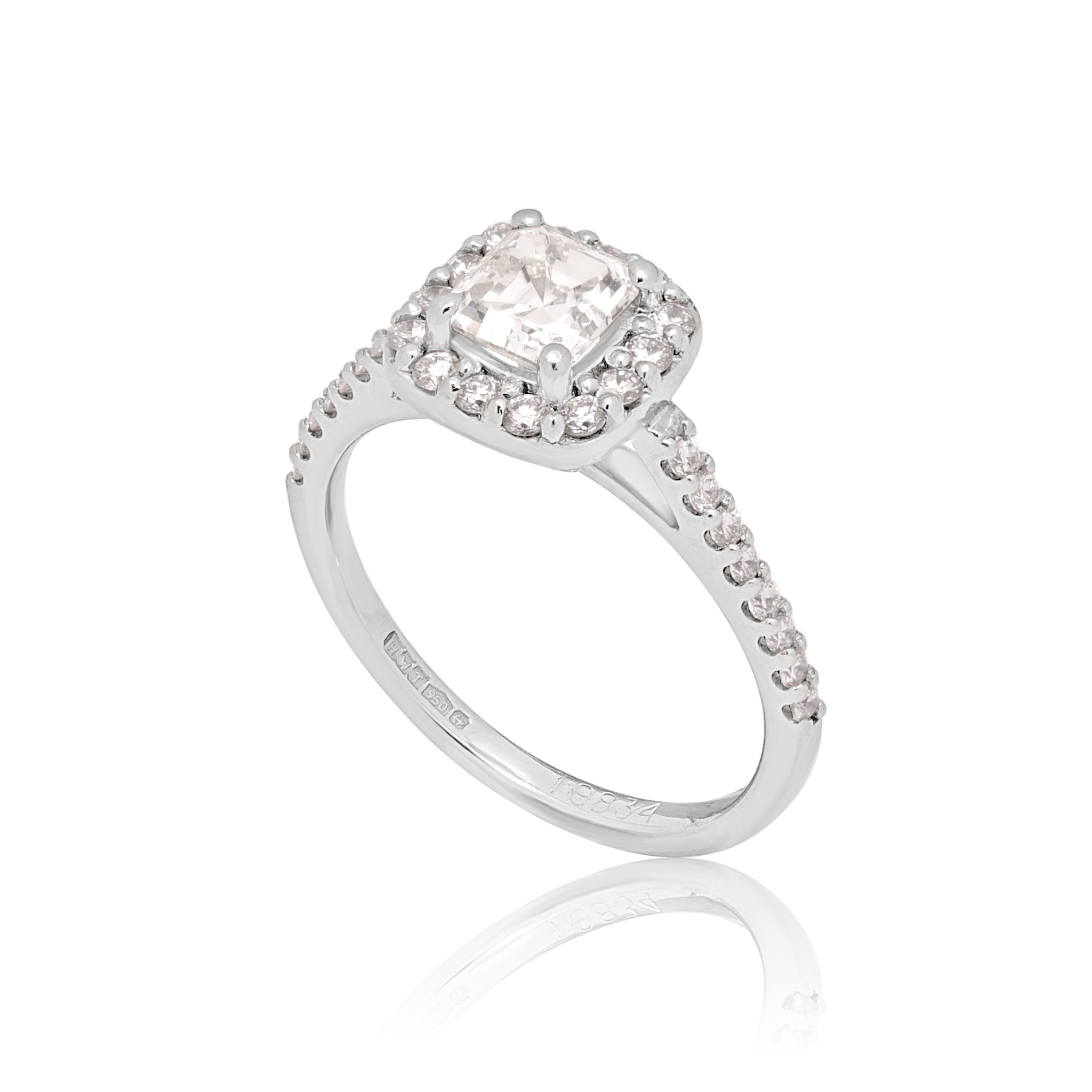 Platinum Asscher Cut Diamond Cluster Ring with Diamond Shoulders A platinum Asscher cut diamond cluster ring with diamond set shoulders.