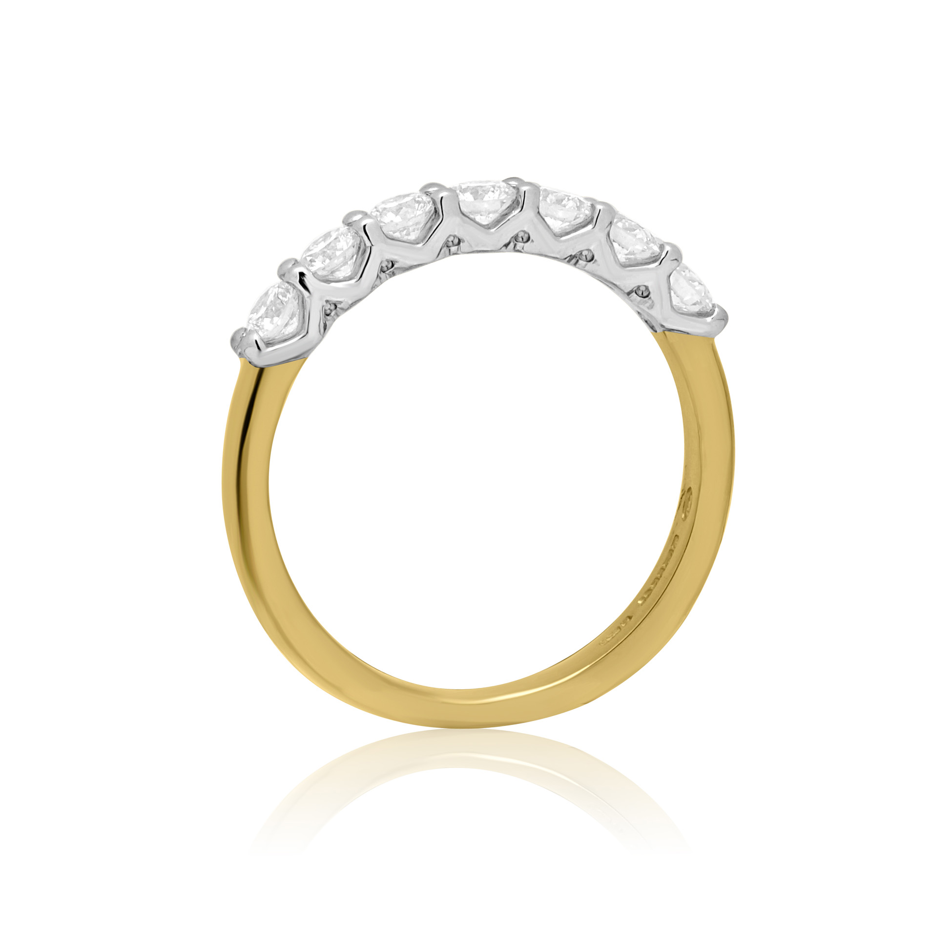 Volante Collection, 18ct Yellow Gold & Platinum Seven Stone Diamond Half Eternity Ring: 0.75 carats An 18ct yellow gold and platinum seven stone diamond half eternity ring with a v-collet setting, belonging to the H. L. Brown Volante Collection.