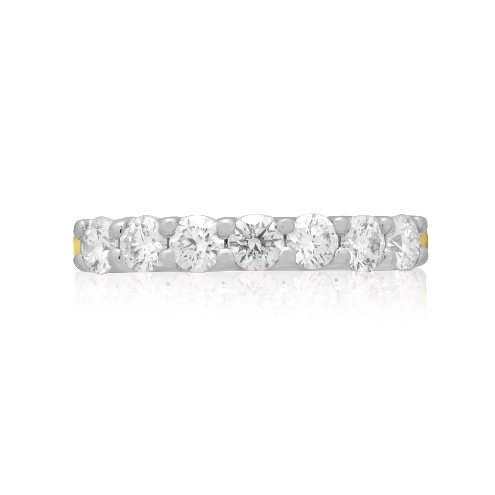 Volante Collection, 18ct Yellow Gold & Platinum Seven Stone Diamond Half Eternity Ring: 0.75 carats An 18ct yellow gold and platinum seven stone diamond half eternity ring with a v-collet setting, belonging to the H. L. Brown Volante Collection.