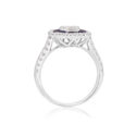 18ct White Gold Sapphire & Diamond Flower Cluster Ring An 18ct white gold oval shaped sapphire and diamond flower cluster ring, with diamond set shoulders.