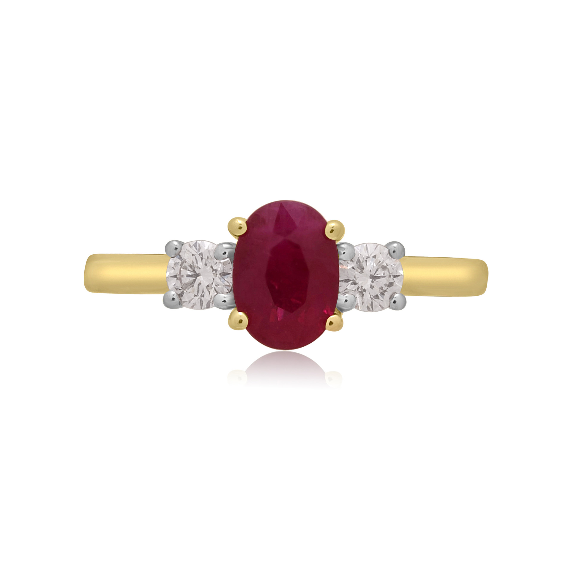 An 18ct yellow gold oval ruby and round brilliant cut diamond three stone ring.