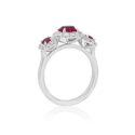 Platinum Ruby & Diamond Triple Cluster Ring A platinum ruby and brilliant cut diamond set triple cluster ring.