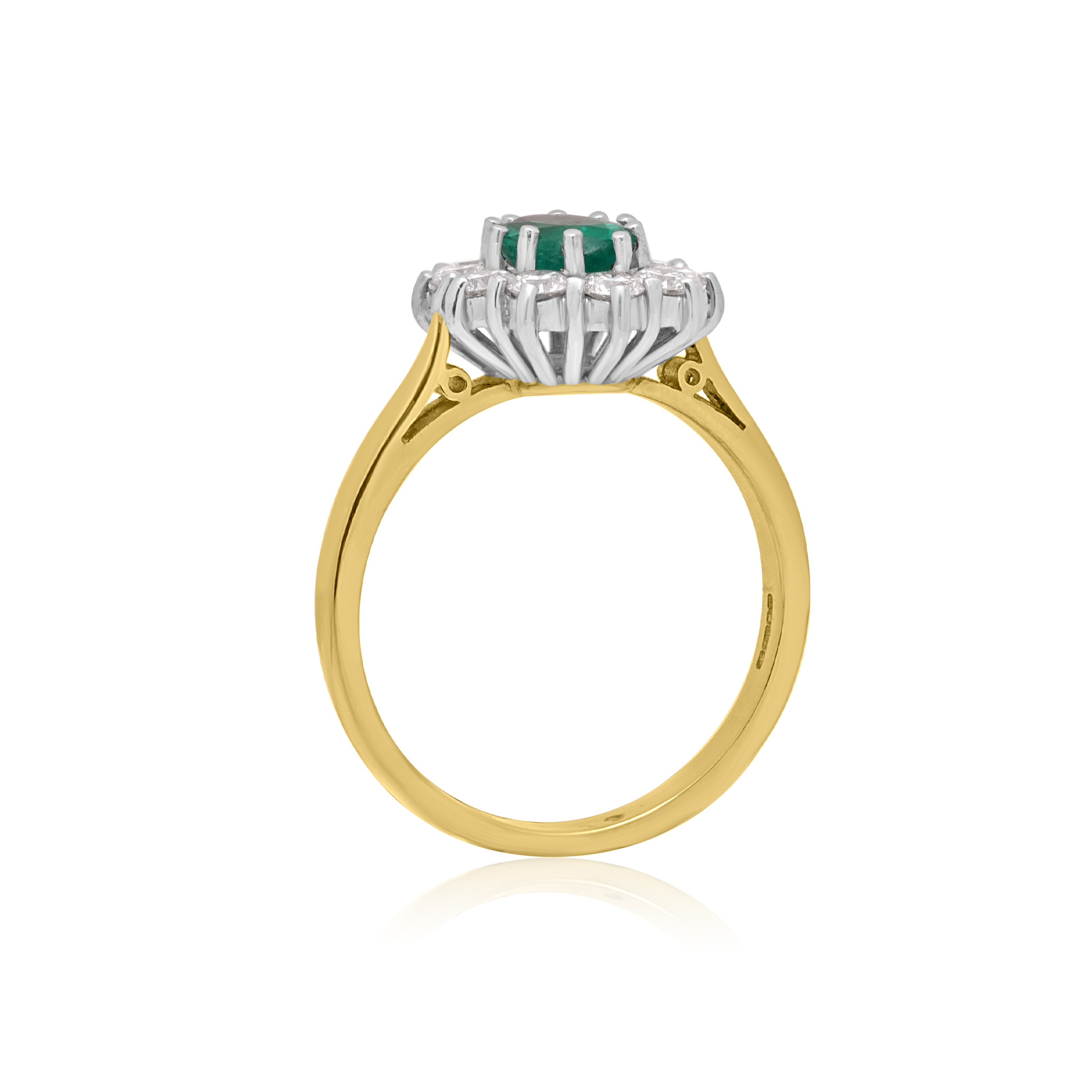 18ct Yellow & White Gold Oval Emerald & Diamond Cluster Ring An 18ct yellow and white gold oval emerald and diamond cluster ring.