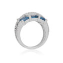 18ct White Gold Topaz & Diamond Ring An 18ct white gold blue topaz six stone fancy cluster ring with diamonds set to the shoulders.