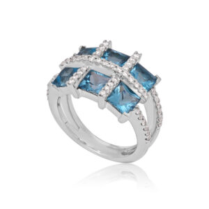 An 18ct white gold blue topaz six stone fancy cluster ring with diamonds set to the shoulders.