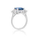 18ct White Gold Emerald Cut Aquamarine & Diamond Dress Ring An 18ct white gold emerald cut aquamarine ring with pear shaped diamond set shoulders.