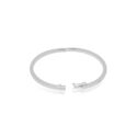 A 9ct white gold round brilliant cut diamond set hinged bangle with a polished finish.