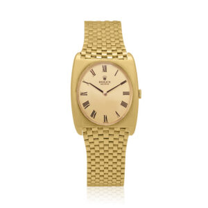 A vintage Rolex Genève with a 20mm 14ct yellow gold case and bracelet strap featuring a two-handed roman numeral, champagne coloured dial.