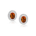 14ct White Gold Oval Citrine & Diamond Cluster Stud Earrings A pair of 14ct white gold oval shaped citrine and round brilliant cut diamond set cluster stud earrings, with a post and butterfly clip fastening for pierced ears.