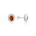 14ct White Gold Oval Citrine & Diamond Cluster Stud Earrings A pair of 14ct white gold oval shaped citrine and round brilliant cut diamond set cluster stud earrings, with a post and butterfly clip fastening for pierced ears.